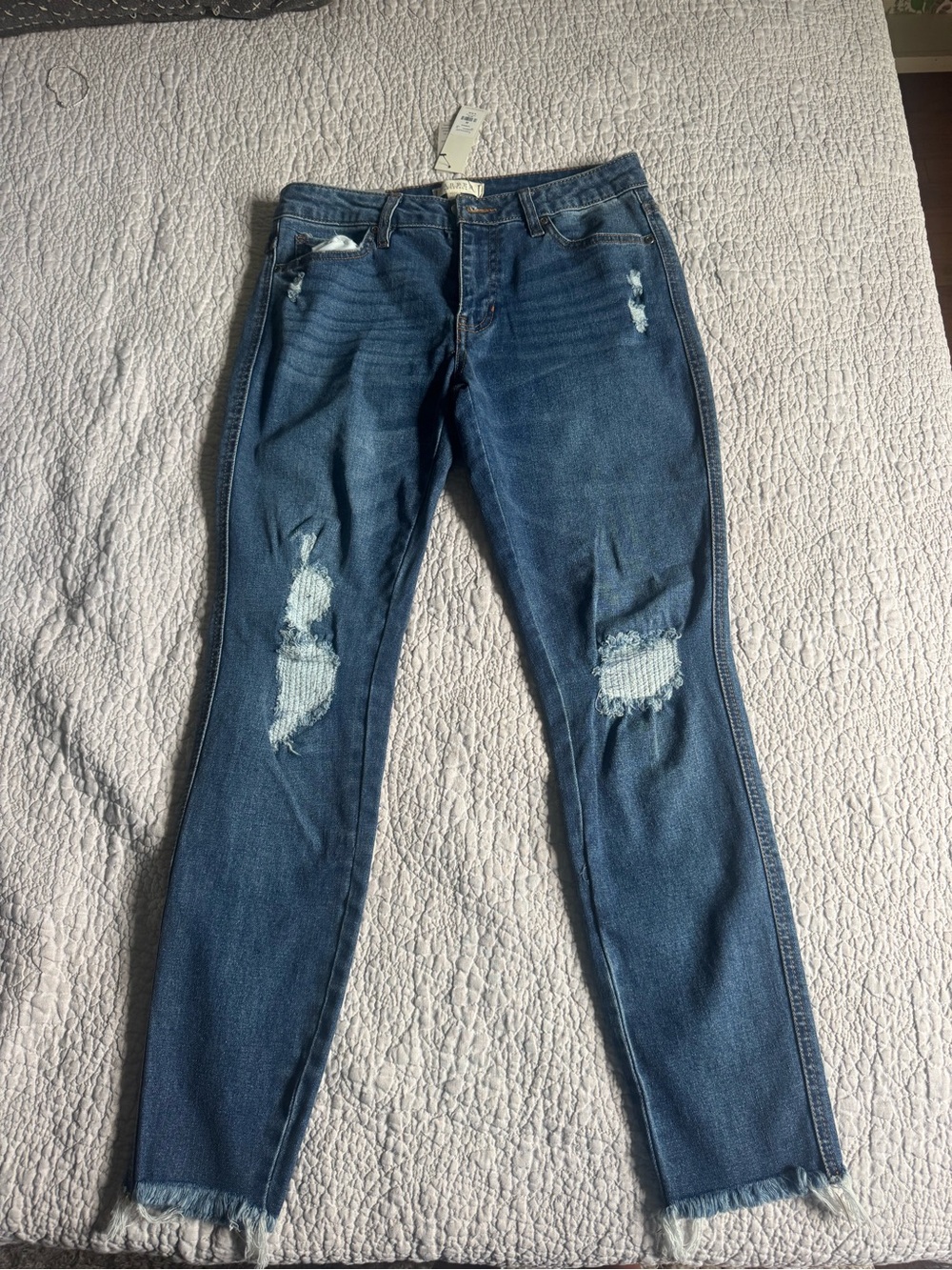 Women's Distressed Mid Wash Blue Jeans